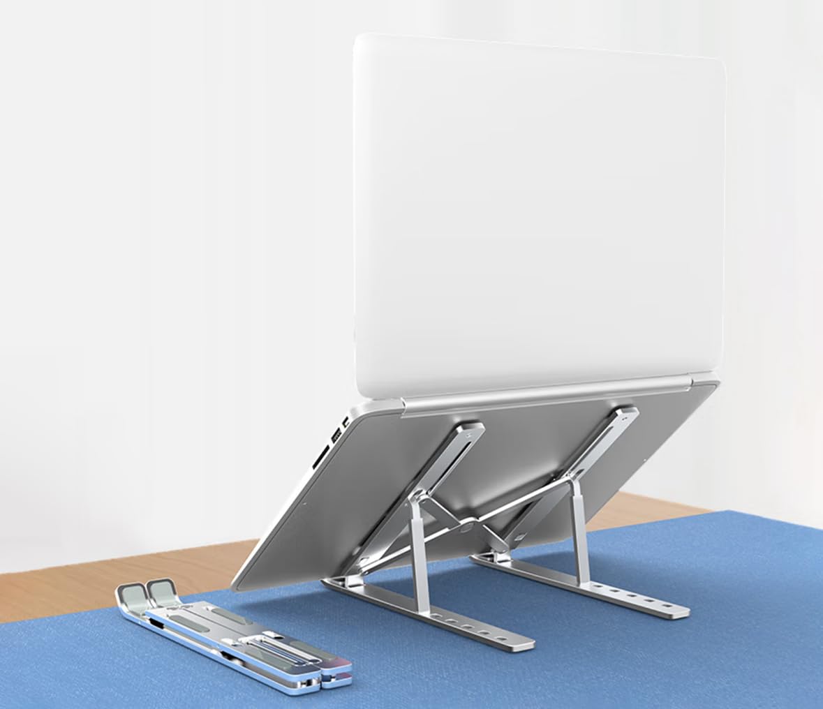Fit4Less Foldable Laptop Stand, adjustable Height,Ergonomic Computer Stand, Aluminium Silver color for Various Laptops no more than 16'' (7 knots
