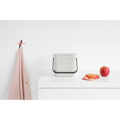 Brabantia - Sort & Go Waste Bin 3L - Small Recycling Bin - Stay Open Lid - Carry Handle - Easy to Clean - for Worktop or Under Kitchen Counter - Food Waste Caddy - Light Grey - 19 x 14 x 18 cm