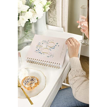 Busy B Wedding Organiser - Beautiful pink and gold spiral-bound wedding organiser with four tabbed sections, checklists, notes and storage pockets