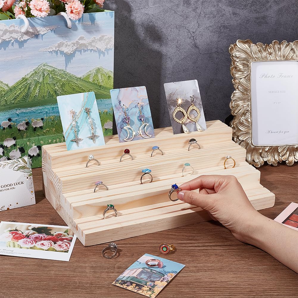 NBEADS 4-Tier Wood Jewelry Display Stand, Wooden Earring Organizer Holder with Grooves Jewelry Showcase Rack for Rings Earring Display Cards Photo