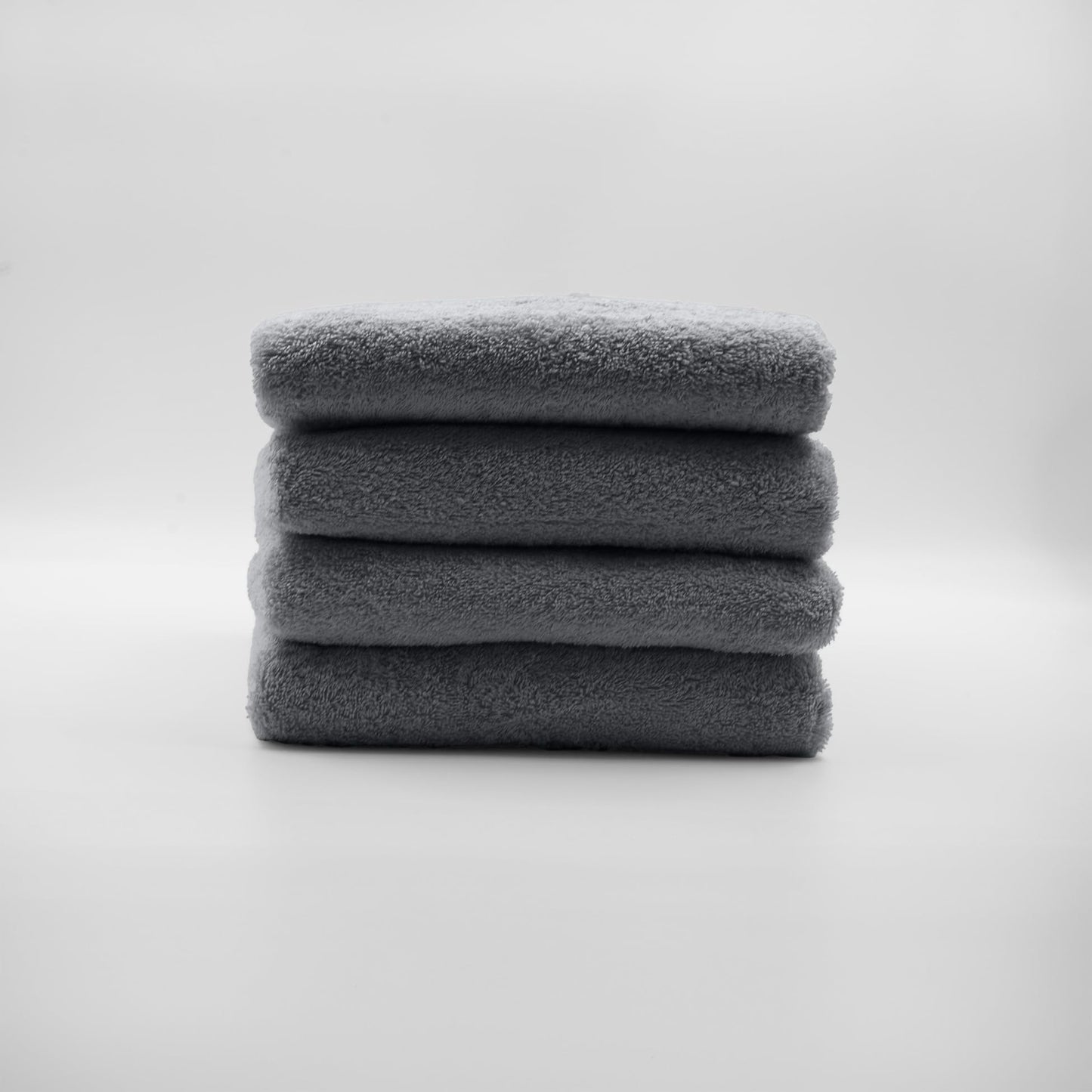Douceur d'Intérieur, Elegance Set of 4 Shower Towels 70 x 130 cm Plain Terry Cloth Anthracite