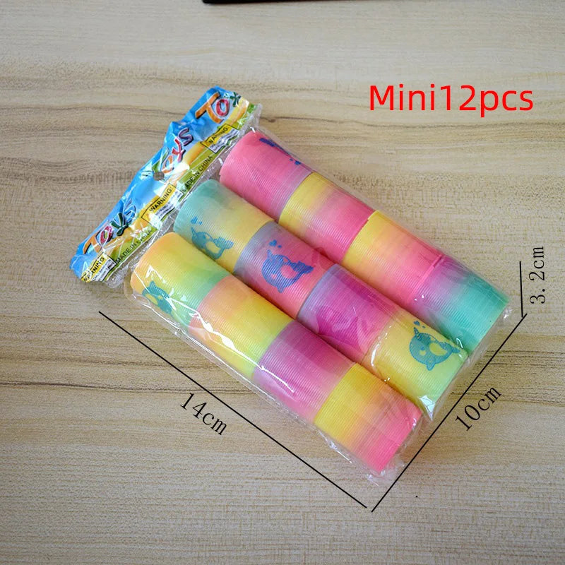 12/24 Rainbow Magic Springs Circle Toys Kids Birthday Party Favors Guests Giveaway Small Gifts Pinata Fillers Flexible Funny Toy