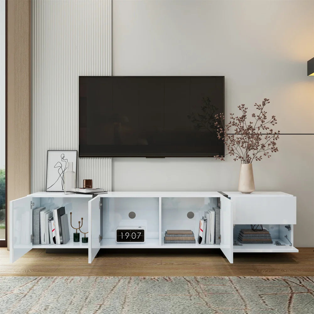 PINGGO TV cabinet, white high-gloss cabinet and black contrasting table legs, with simple cabinet doors and drawers.