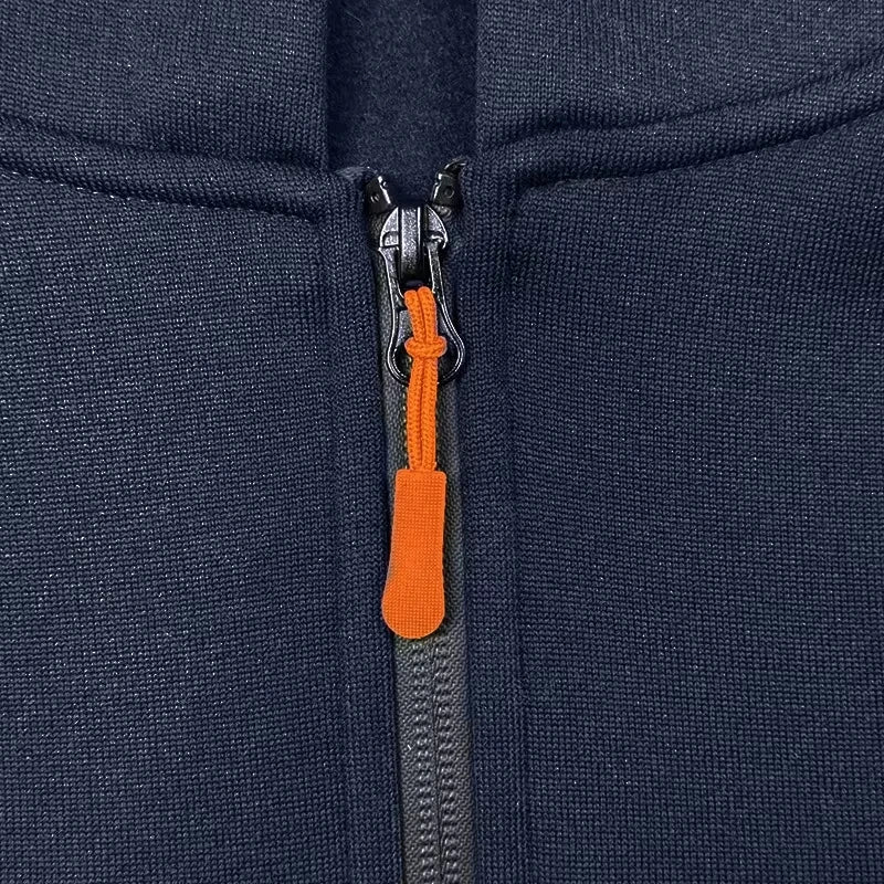 The KTM “Ready to Race” printed half-zip hoodie features workwear pockets and arm pockets, perfect for motorcycle enthusiasts.