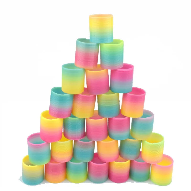 24PCS Rainbow Magic Springs Circle Toys Kids Birthday Party Favors Guests Giveaway Small Gifts Pinata Fillers Flexible Funny Toy