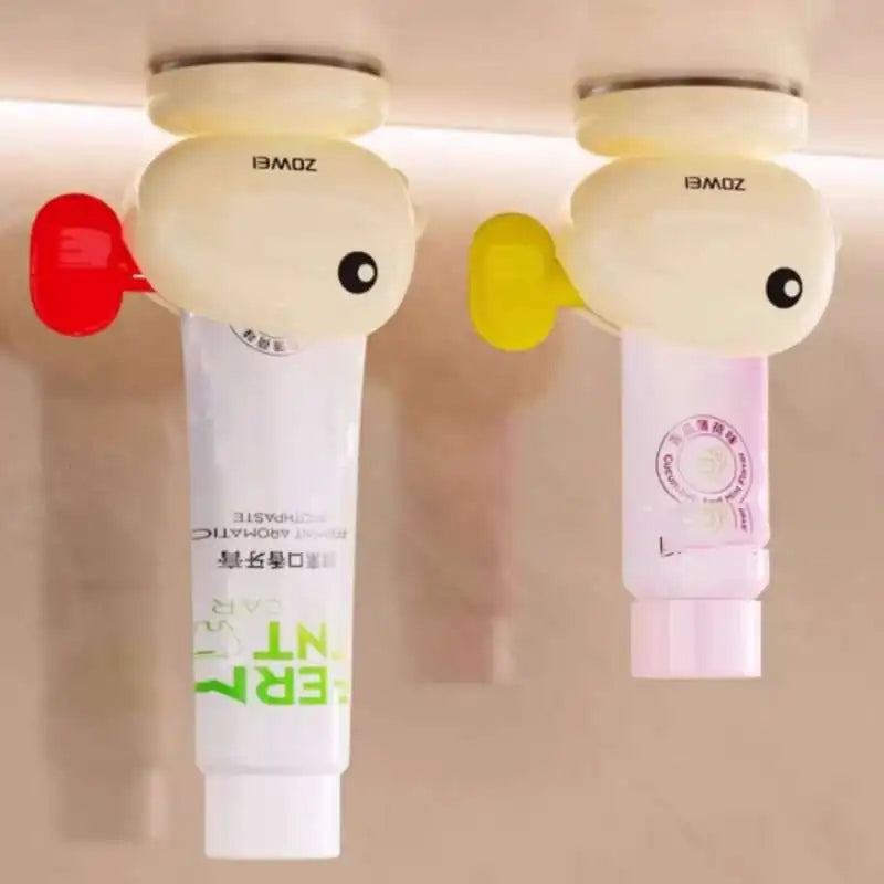 Cute Whale Manual Toothpaste Squeezer Storage Rack with Suction Cup Toothpaste Rolling Dispenser Facial Cleanser Squeeze Clip